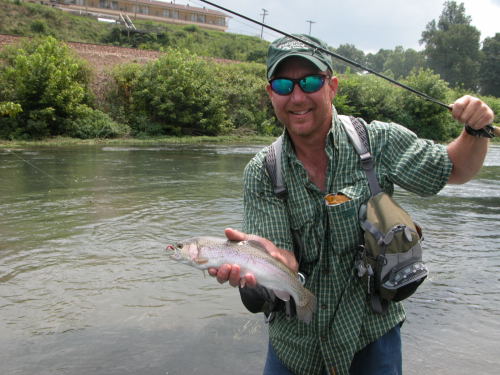 Brent McClane with a nice rainbow trout caught on the Spring River.